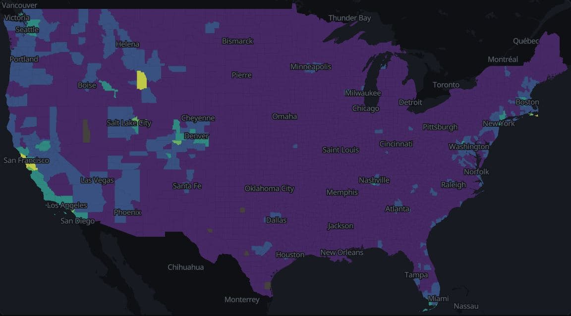 Median home value by US county, lower 48 states, ACS 2019-2023, in five equal-width classes on the viridis palette. Nearly every county falls in the lowest class; a few coastal and resort counties reach the upper classes.