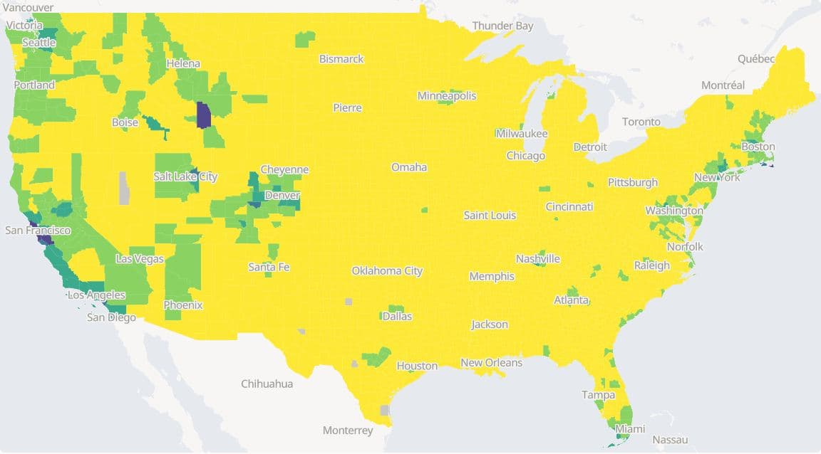Median home value by US county, lower 48 states, ACS 2019-2023, in five equal-width classes on the viridis palette. Nearly every county falls in the lowest class; a few coastal and resort counties reach the upper classes.